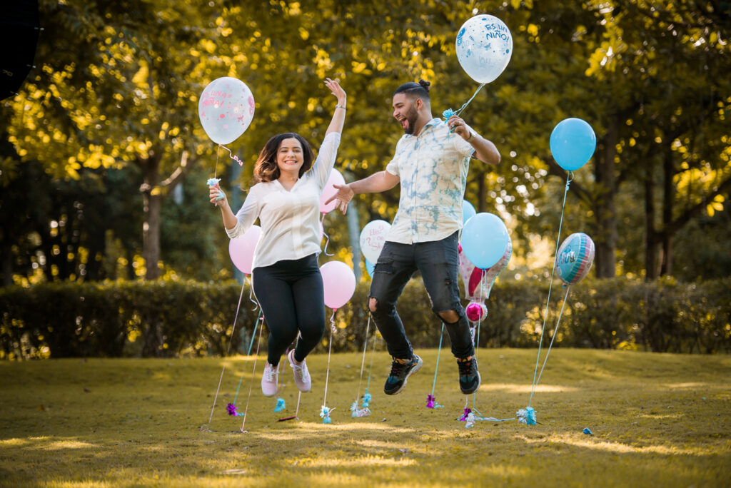 Sesion de fotos de revelacion de sexo del bebe durante el embarazo en el Jardín Botánico de Santo Domingo, Republica Dominicana por el fotografo dominicano