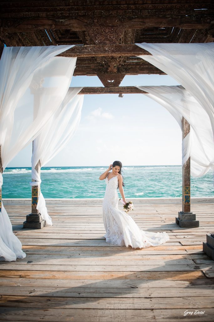 Fotógrafo de boda en Boca Chica, Restaurante Boca Marina, República Dominicana, realizada por Greg Dotel Photography, fotógrafo profesional especializado en bodas y momentos especiales.