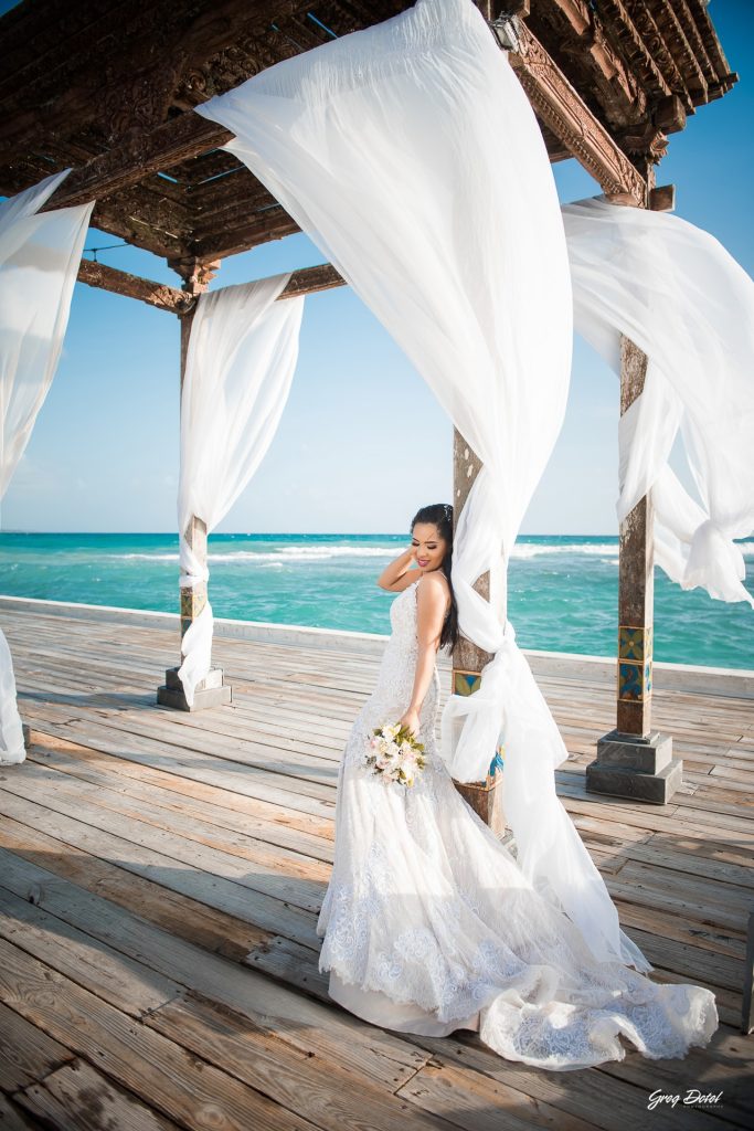Fotógrafo de boda en Boca Chica, Restaurante Boca Marina, República Dominicana, realizada por Greg Dotel Photography, fotógrafo profesional especializado en bodas y momentos especiales.