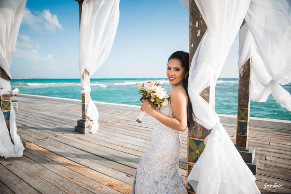 Fotógrafo de boda en Boca Chica, Restaurante Boca Marina, República Dominicana, realizada por Greg Dotel Photography, fotógrafo profesional especializado en bodas y momentos especiales.